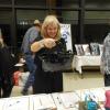 Cynde Bell checks out the silent auction