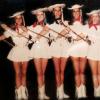 Dana Blair as an Rangerette officer (Right)